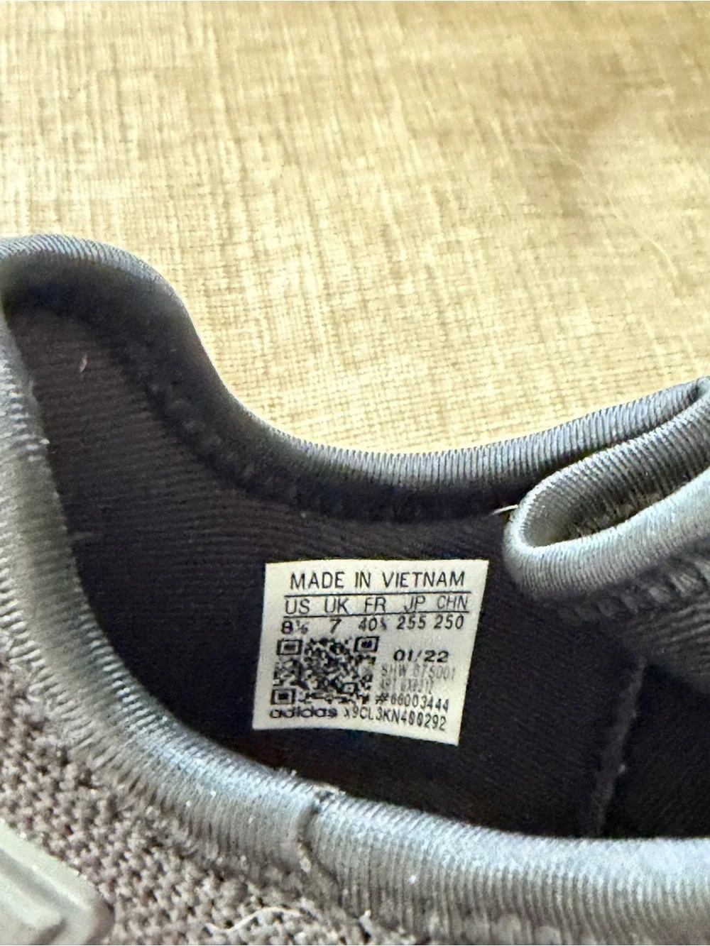 adidas Black PRIMEBLUE NMD R1 Sneakers with Pink Trefoil Accent